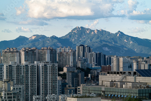 Skyline of Donam-dong building and the natural scenery of Bulamsan Mountain in Seoul, South Korea.
