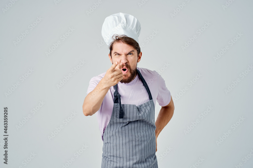 man in chef's uniform emotions restaurant work Professional man in chef's uniform emotions restaurant work Professional