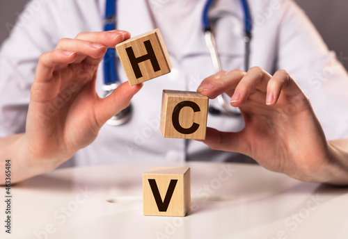 HCV acronym for medical test. Word on cubes. photo