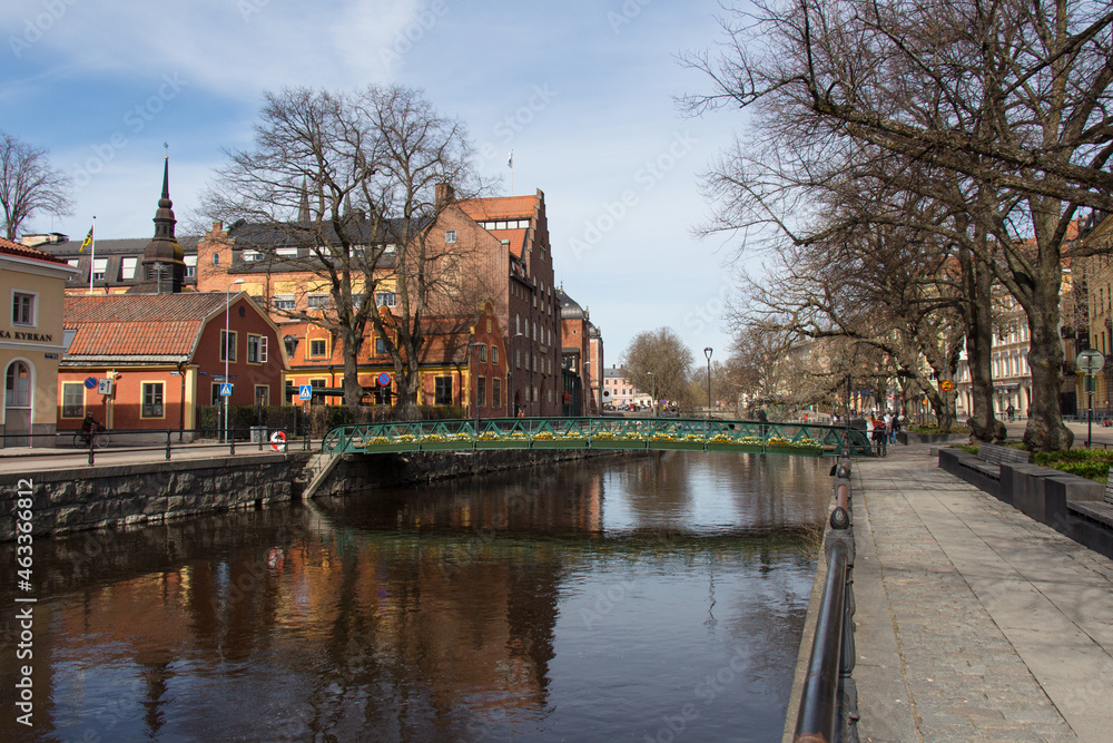 Obraz premium Bridge on a canal of Uppsala, Sweden.