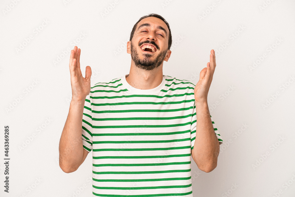 Young caucasian man isolated on white background laughs out loudly keeping hand on chest. Young caucasian man isolated on white background laughs out loudly keeping hand on chest.