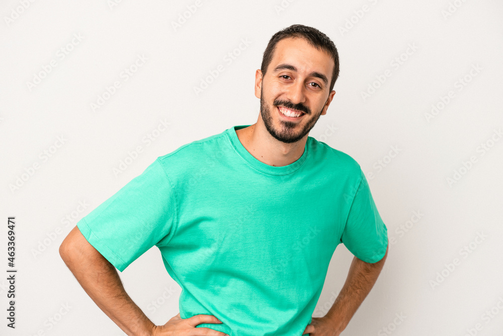 Fototapeta premium Young caucasian man isolated on white background happy, smiling and cheerful.