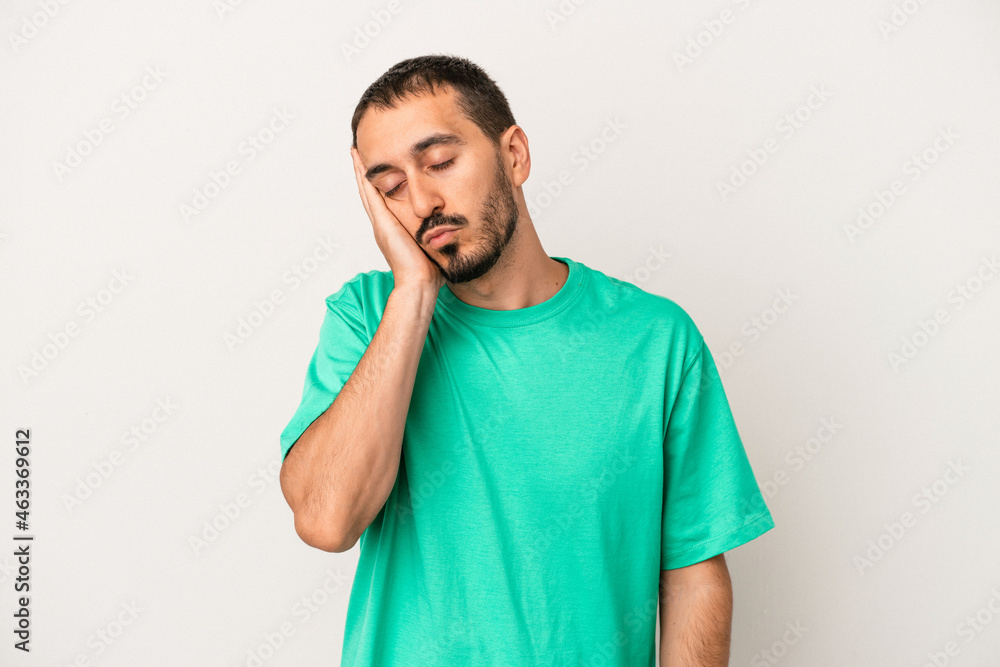 Young caucasian man isolated on white background who is bored, fatigued and need a relax day. Young caucasian man isolated on white background who is bored, fatigued and need a relax day.