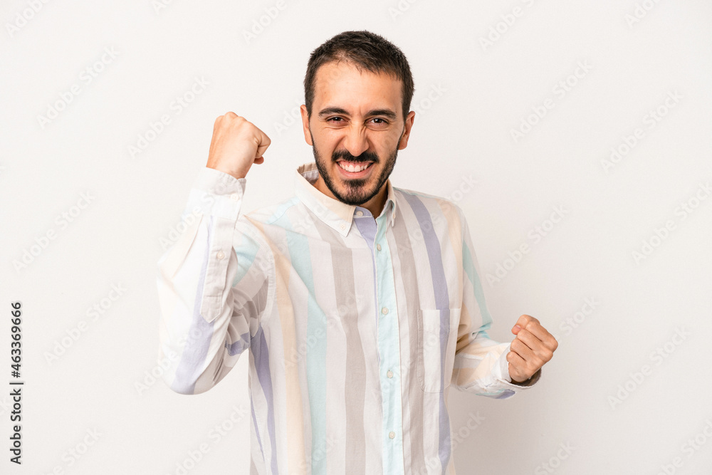 Young caucasian man isolated on white background cheering carefree and excited. Victory concept. Young caucasian man isolated on white background cheering carefree and excited. Victory concept.