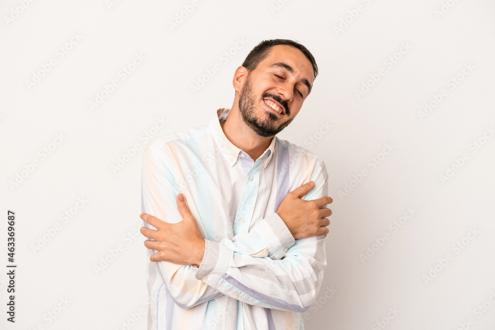Young caucasian man isolated on white background laughing and having fun. Young caucasian man isolated on white background laughing and having fun.