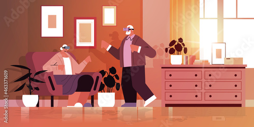 senior couple wearing vr headset grandparents in digital glasses exploring virtual reality interactive services active old age