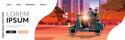 senior couple in helmets driving scooter on city street grandparents traveling on moped active old age concept