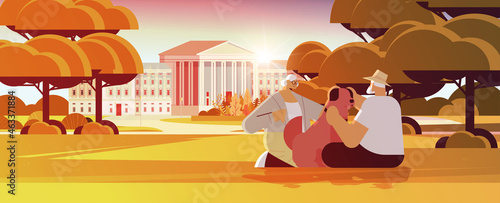 senior couple spending time with little dog relaxation retirement concept