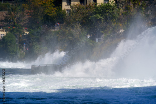 Famous Rhine Falls with rocks and trees on a beautiful autumn day. Photo taken September 25th  2021  Z  rich  Switzerland.