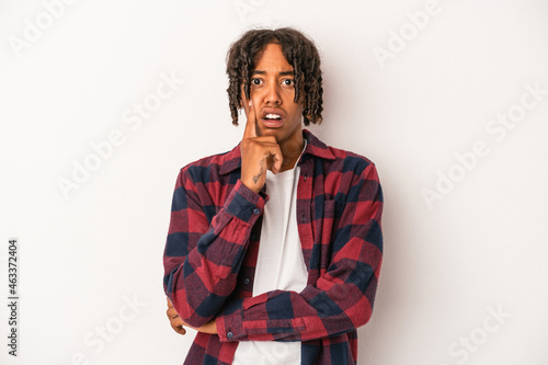 Young african american man isolated on white background having some great idea, concept of creativity.