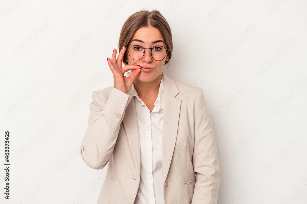 Young Russian business woman isolated on white background with fingers on lips keeping a secret.