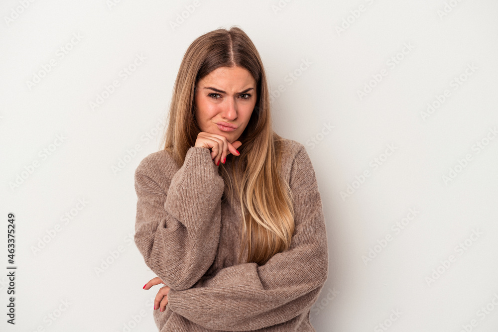 Young Russian woman isolated on white background throwing a punch, anger, fighting due to an argument, boxing. Young Russian woman isolated on white background throwing a punch, anger, fighting due to an argument, boxing.