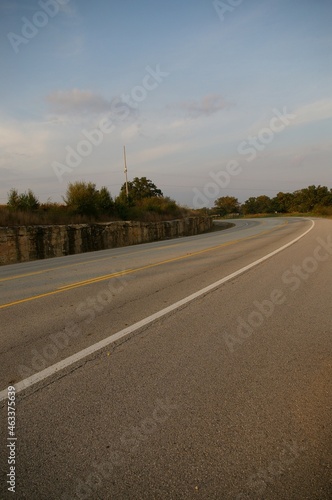 Curve in asphalt highway