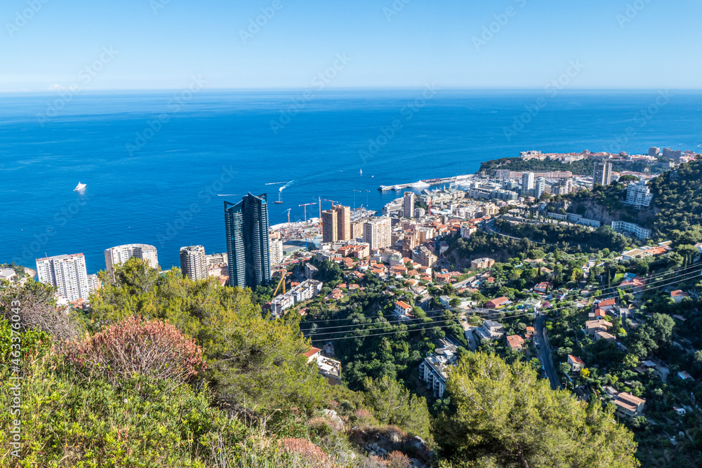 Aerial view of Monaco with skyscrapers and blue sea Aerial view of Monaco with skyscrapers and blue sea
