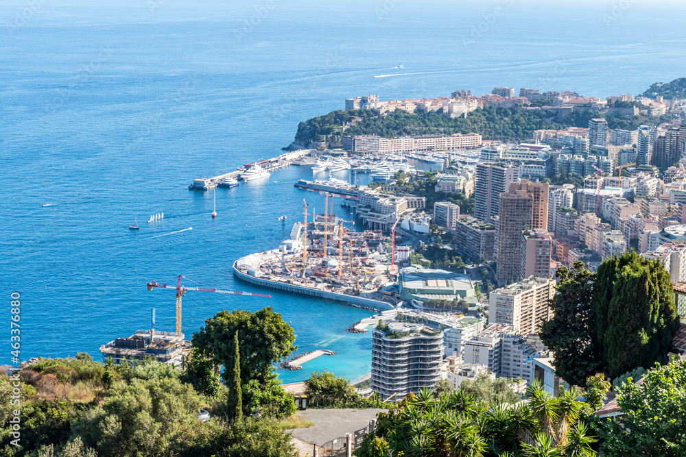 Aerial view of Monaco with skyscrapers and blue sea