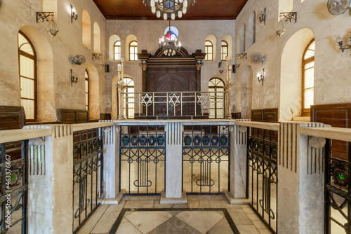 Altar of historic Jewish Maimonides Synagogue or Rav Moshe Synagogue with wooden entrance at the far end, Gamalia district, Cairo, Egypt photo