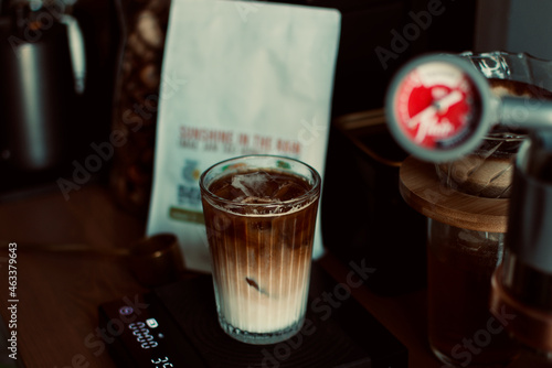 ice latte coffee in glass with digital scale