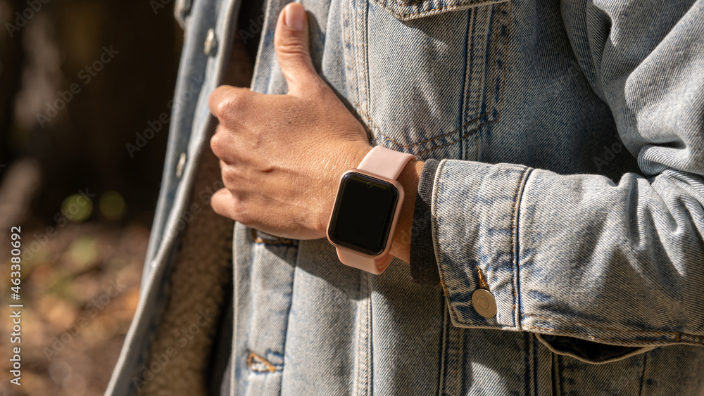 Woman hands in smart watch walking outdoors, step counting, fitness tracker, close up, copy space Woman hands in smart watch walking outdoors, step counting, fitness tracker, close up, copy space