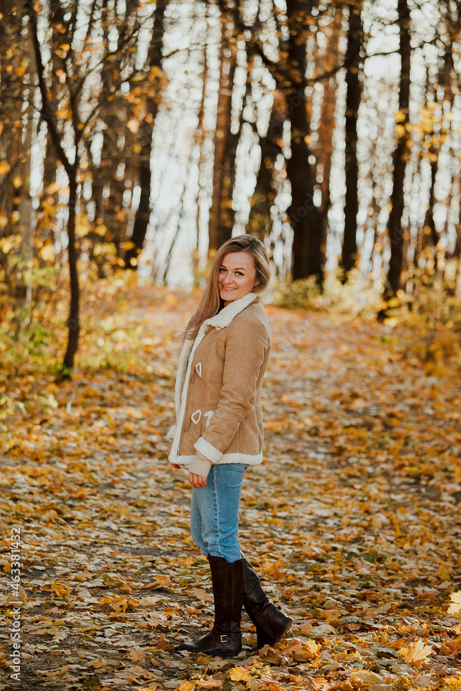 a blonde adult girl walks in the autumn forest. a walk in the fresh air alone
a blonde adult girl walks in the autumn forest. a walk in the fresh air alone
