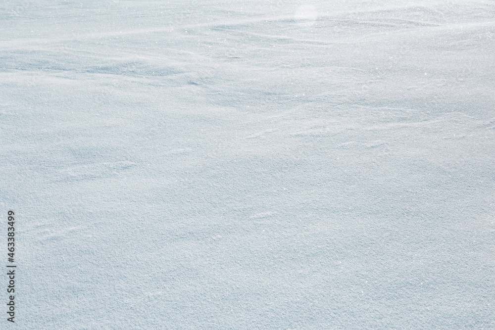 Natural snow texture, white blue snowy background, frozen surface Natural snow texture, white blue snowy background, frozen surface