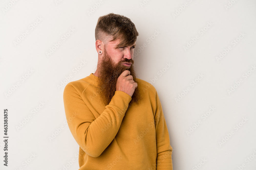 Young caucasian ginger man with long beard isolated on white background suffers pain in throat due a virus or infection. Young caucasian ginger man with long beard isolated on white background suffers pain in throat due a virus or infection.
