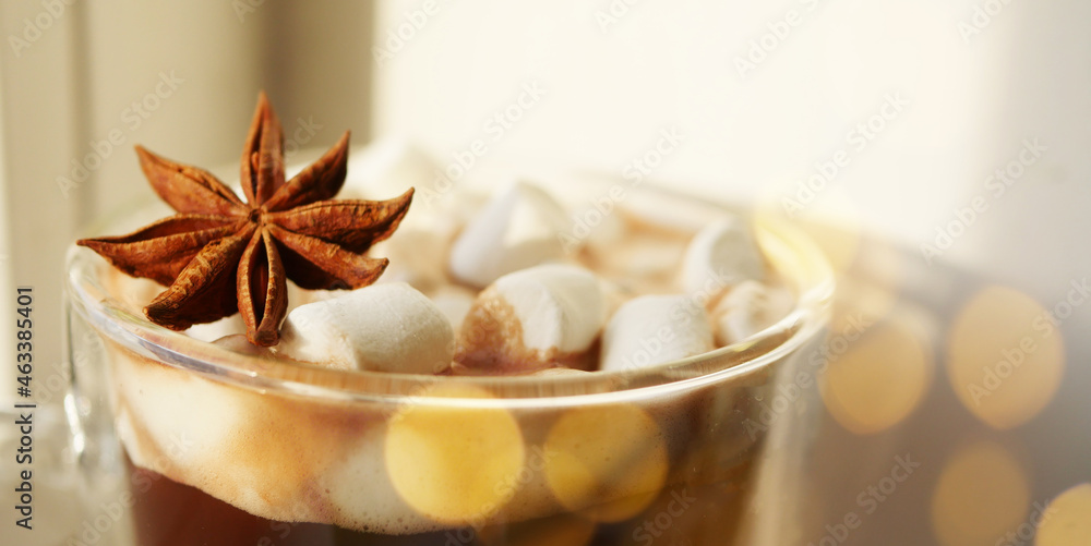 Hot cocoa with anise banner. Cozy Christmas drink. Shiny festive glowing 