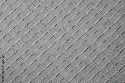 Texture of geometric pattern on metallic surface.