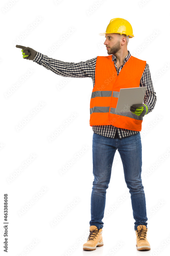 Foreman in yellow helmet and reflective waistcoat is directing. Full length isolated on white background. Foreman in yellow helmet and reflective waistcoat is directing. Full length isolated on white background.