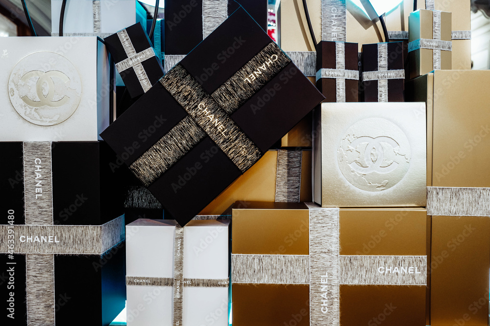 Chanel Gold and Black Christmas Gift Boxes Stock Photo