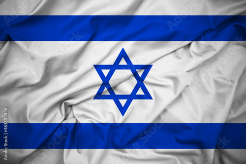 Close Up Flag of Israel, Front View. Blue Star of David Between Two Horizontal Blue Stripes on White Background. Shiny Silk Fabric. Detailed Texture. 