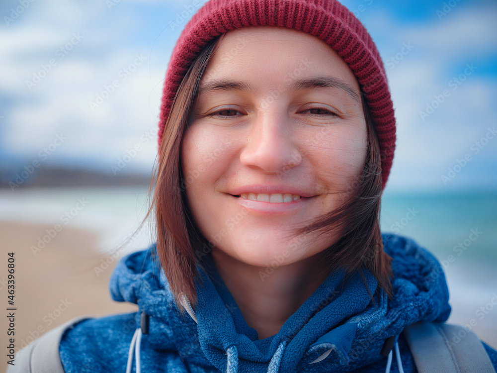 woman taking selfie on smartphone, female travels along the coast in the cold season. Outdoor. POV. Close up woman taking selfie on smartphone, female travels along the coast in the cold season. Outdoor. POV. Close up