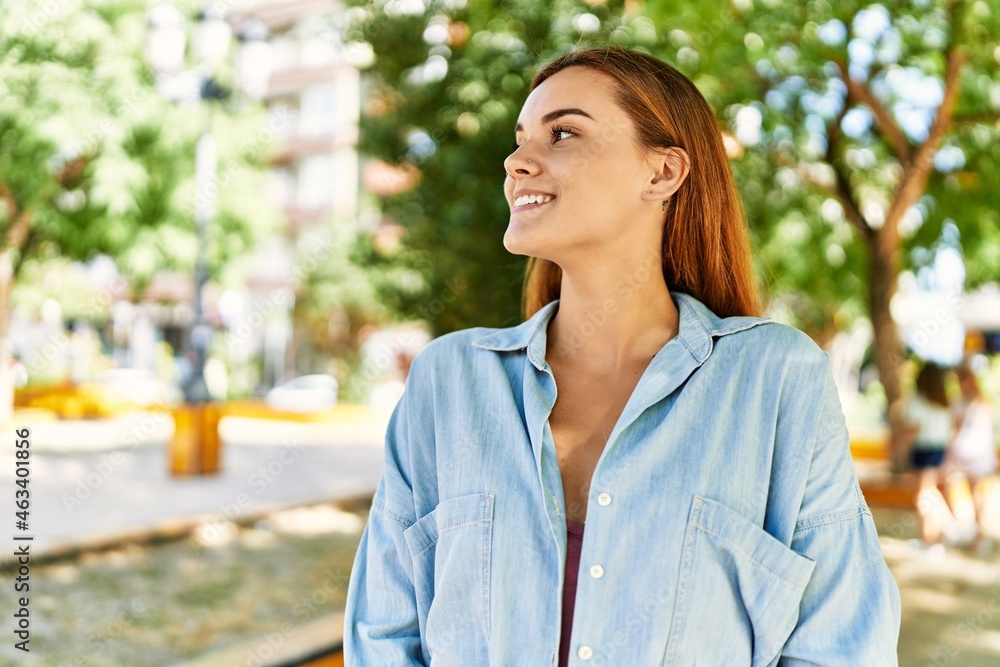Young hispanic girl smiling happy standing at the city. Young hispanic girl smiling happy standing at the city.