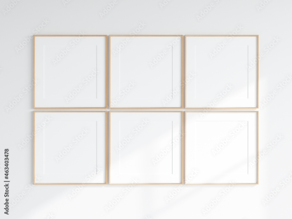 six wooden square frames on the white wall, gallery frame mockup Stock