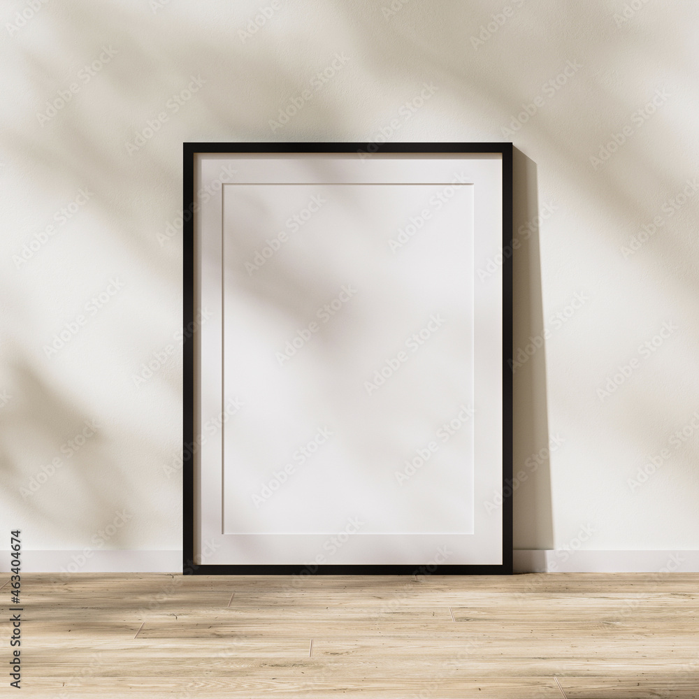 blank black frame with mat mock up, poster frame on wooden floor with sunlight with leaves shadow on white wall, 3d rendering blank black frame with mat mock up, poster frame on wooden floor with sunlight with leaves shadow on white wall, 3d rendering