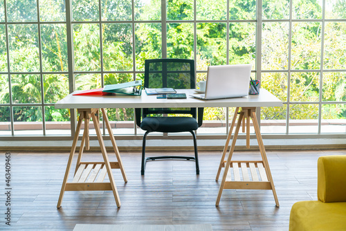 working table with laptop and gadget