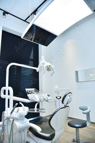 Dental office with dental chair and equipment.