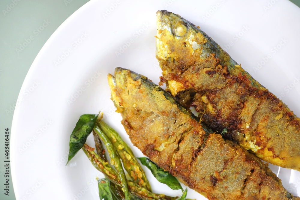 Indian Mackerel fish fry. Bangda Rava fry. whole Fried fish served on a
