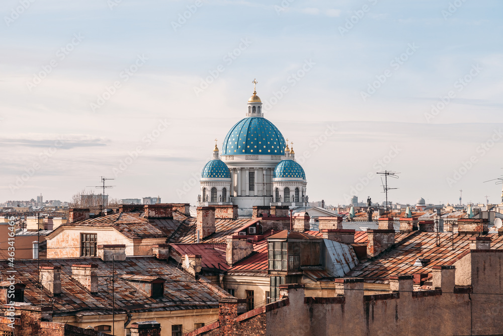 Aerial photo of Trinity Cathedral towering over the roofs of residential buildings. Cityscape of Saint Petersburg. Orthodox Russian Cathedral. Travel destination. Troitsky sobor.