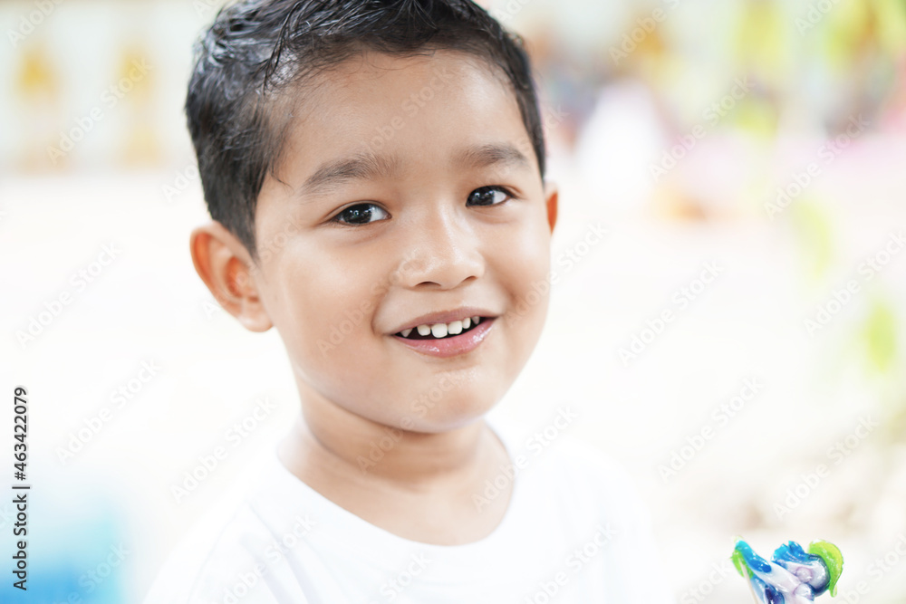Portrait of cute happy Asian kid looking some one around. Portrait of cute happy Asian kid looking some one around.