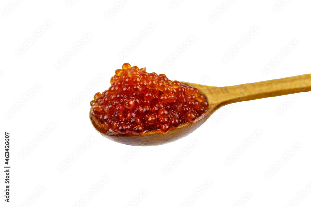 Red caviar in wooden spoon isolated on white background Red caviar in wooden spoon isolated on white background