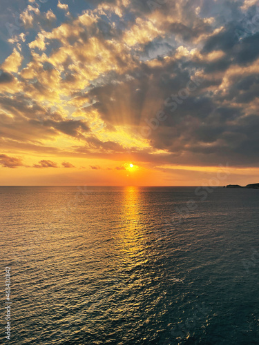 Beautiful sunset with a dramatic sky and clouds over the sea