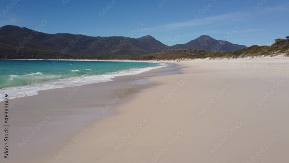 Left to right pan motion of Wineglass Bay beach near water's edge in the Freycinet national Park,Tasmania, Australia Left to right pan motion of Wineglass Bay beach near water's edge in the Freycinet national Park,Tasmania, Australia