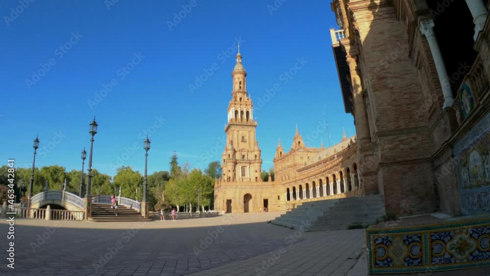 Seville, Spain, September 11, 2021: SLOW MOTION SHOT - The Spanish Steps in Seville or 'Plaza de España', where the main building of the Ibero-American Exhibition of 1929 was built. The North Tower. Seville, Spain, September 11, 2021: SLOW MOTION SHOT - The Spanish Steps in Seville or 'Plaza de España', where the main building of the Ibero-American Exhibition of 1929 was built. The North Tower.