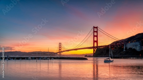 Golden Gate Bridge at sunset from a marina © Loc