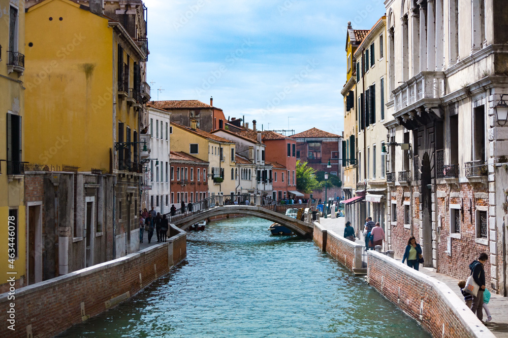 A bridge crossing a canal in Venice, Italy