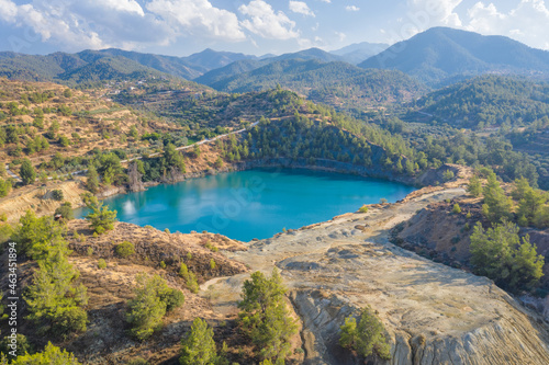 Memi mine lake, abandoned copper mine in Cyprus with the environment partially recovered and reforested photo