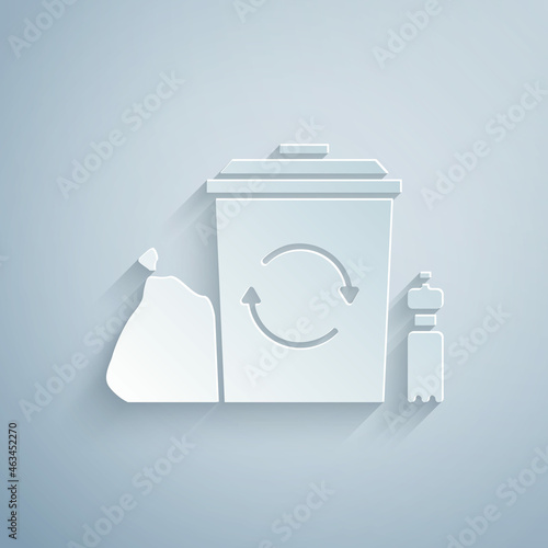 Paper cut Recycle bin with recycle symbol icon isolated on grey background. Trash can icon. Garbage bin sign. Recycle basket. Paper art style. Vector Illustration