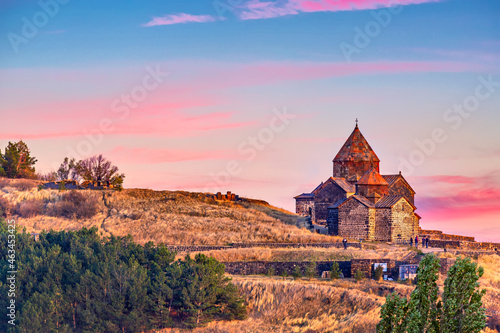 Ancient Sevanavank monastery on Lake Sevan in Armenia during sunset © Nikolay N. Antonov