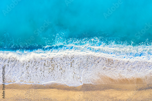 Top view aerial drone photo of Myrtos beach with beautiful turquoise water and sea waves. Vacation travel background. Ionian sea  Kefalonia Island  Greece