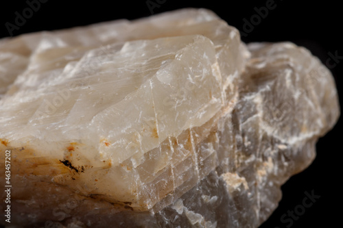 Macro mineral stone Moonstone a black background photo